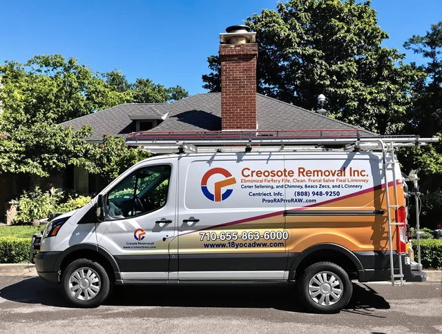 Harrisburg Chimney Sweep technician removing creosote safely in Harrisburg, NC